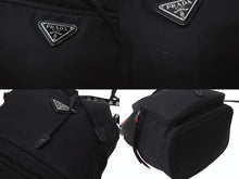 Load image into Gallery viewer, PRADA プラダ スタッズ 巾着 ショルダーバッグ 1BH038 イタリア製 ナイロン レザー ブラック レッド シルバー金具 美品 中古 4b002886
