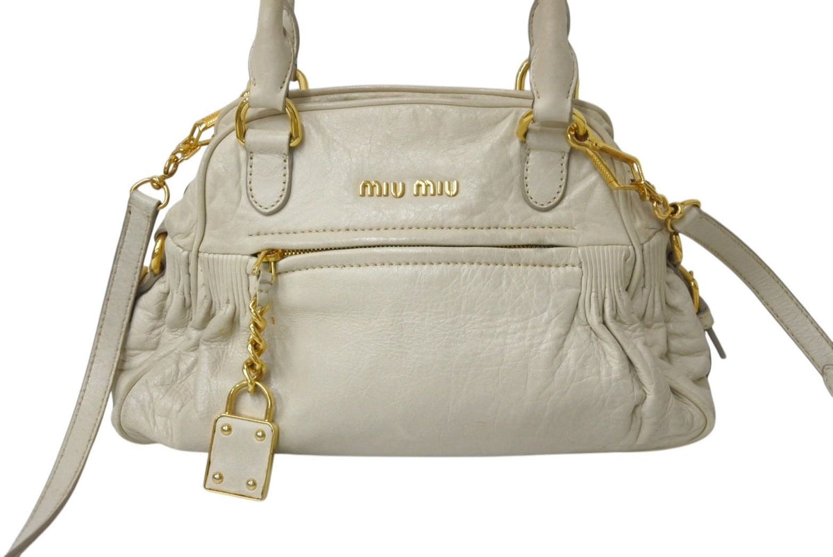 MIU MIUゴールドスパンコールバッグ 名古屋】【MIUMIU】ミュウミュウ スパンコール クラッチバッグ