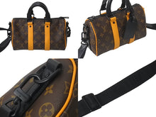 Load image into Gallery viewer, LOUIS VUITTON ルイヴィトン モノグラムマカサー キーポル バンドリエール 25 M46687 ブラウン ブラック金具 美品 中古 4b001072