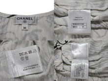 Load image into Gallery viewer, 極美品 CHANEL シャネル タンクトップ ノースリーブ P61823V47215 サイズ36 グラフィティ ココマーク ホワイト ブラック 中古 4b001105