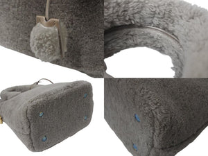 新品同様 LOUIS VUITTON ルイヴィトン 2011AW ロックイット ヴォワヤージュ M93850 ムートン レザー グリペルル ゴールド金具 中古 4b001189