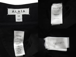 ALAIA アライア SPIRALE スピラーレ ジーンズ デニムパンツ AA9P0295D003A サイズ34 螺旋ジップ ブラック 美品 中古 4b001286