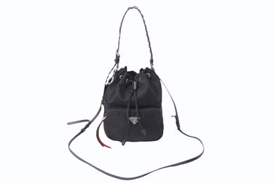 PRADA プラダ スタッズ 巾着 ショルダーバッグ 1BH038 イタリア製 ナイロン レザー ブラック レッド シルバー金具 美品 中古 4b002886