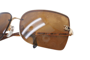 CHANEL シャネル リムレス サングラス 4112 c.125/73 サイズ65◻︎16 120 ココマーク ブラウン メタル レザー 良品 中古 4b002926