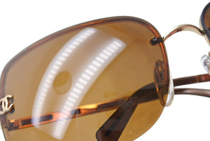 CHANEL シャネル リムレス サングラス 4112 c.125/73 サイズ65◻︎16 120 ココマーク ブラウン メタル レザー 良品 中古 4b002926