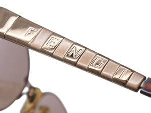 極美品 FENDI フェンディ サングラス ロゴモチーフ ブラウンレンズ 度入り SL7166 イタリア製 メタルブラウン ゴールド金具 中古 4b003952 