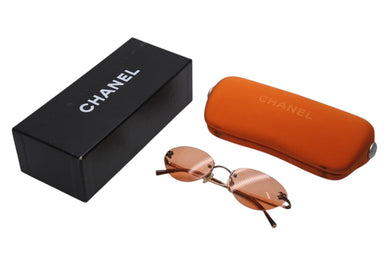 CHANEL シャネル リムレス ココマーク サングラス オレンジ プラスチック メタル ロゴ 53☐19 4003 ブロンズ金具 美品 中古 4b003962