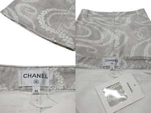 新品同様 CHANEL シャネル 2025年 ココ ビーチ コレクション プリント フレア デニムパンツ グレー ホワイト コットン P78561V71097 サイズ46 中古 4b004013