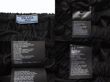 Load image into Gallery viewer, 極美品 PRADA プラダ ナイロン ミニスカート 21H853 サイズ38 フレア ブラック イタリア製 中古 4b004126
