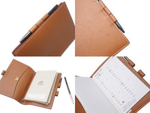 Load image into Gallery viewer, HERMES エルメス アジェンダ クシュベル カバー メモ帳 ペン付き ブラウン レザー 美品 中古 4b004727