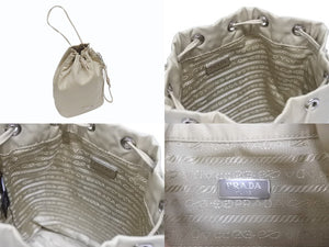 極美品 PRADA プラダ ハンドバッグ 巾着型 ロゴプレート Re-Nylon ポーチ 1NS369 ナイロン ベージュ 中古 4b005304