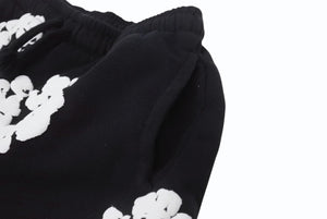新品同様 DENIM TEARS デニムティアーズ スウェットパンツ キッズ用 RN162838 ブラック コットン サイズ4Y 中古 4b005353