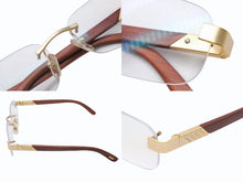Load image into Gallery viewer, CARTIER カルティエ ウッドテンプル リムレスメガネ T8100433 ブラウン ウッド GP ゴールド金具 美品 中古 4b005371