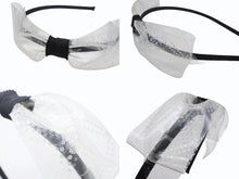 Load image into Gallery viewer, CHANEL シャネル カチューシャ ヘアバンド ココマークリボン18S刻印 クリア ブラック PVC 美品 中古 4b005527