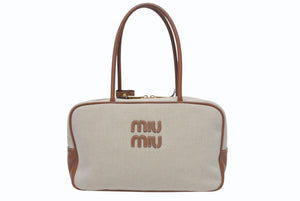極美品 MIUMIU ミュウミュウ トップハンドルバッグ ナチュラル 5BB163 イタリア製 キャンバス レザー ロゴ ベージュ 中古 4c005786