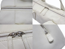 Load image into Gallery viewer, CHANEL シャネル シェブロン Vステッチ ハンドバッグ 10番台 A30899 ココマーク ホワイト シルバー金具 美品 中古 4b006082