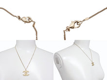 Load image into Gallery viewer, CHANEL シャネル ココマーク グリッター ネックレス 重量約7.9g 10A刻印 全長約47cm ゴールド メタル 美品 中古 4b0064327