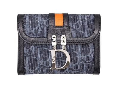 Like new Christian Dior bifold compact wallet in Trotter line, navy, black, and orange, pre-owned, item number 4b007438 