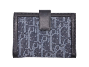 Like new Christian Dior bifold compact wallet in Trotter line, navy, black, and orange, pre-owned, item number 4b007438 