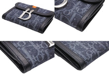 Load image into Gallery viewer, Like new Christian Dior bifold compact wallet in Trotter line, navy, black, and orange, pre-owned, item number 4b007438 