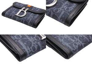 Like new Christian Dior bifold compact wallet in Trotter line, navy, black, and orange, pre-owned, item number 4b007438 