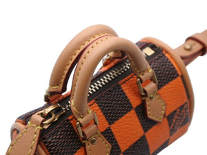 新品未使用 LOUIS VUITTON ルイヴィトン ポーチ ダミエ ポップ ミニ スピーディ チャーム R94096 サンプル品 オレンジ 中古 4b007755