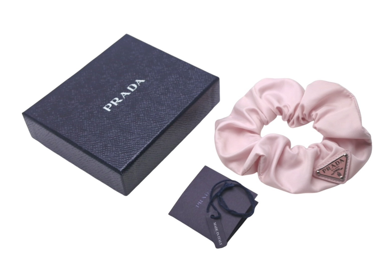 PRADA ピンク アクリル ヘアピン Prada プラダ ロゴ ヘアクリップ | ピンク | FARFETCH JP
