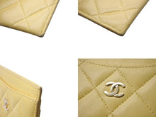 Load image into Gallery viewer, CHANEL シャネル マトラッセ カードケース ココマーク 22番台 スペイン製 ラムスキン イエロー ゴールド金具 美品 中古 4c068815
