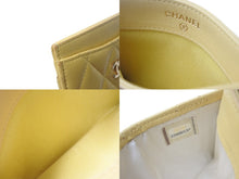 Load image into Gallery viewer, CHANEL シャネル マトラッセ カードケース ココマーク 22番台 スペイン製 ラムスキン イエロー ゴールド金具 美品 中古 4c068815