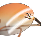 Load image into Gallery viewer, CHANEL シャネル ココマーク サングラス メガネ リムレス グラデーション イタリア製 メタル オレンジ ゴールド 美品 中古 4c068922