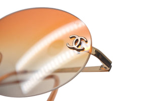 CHANEL シャネル ココマーク サングラス メガネ リムレス グラデーション イタリア製 メタル オレンジ ゴールド 美品 中古 4c068922
