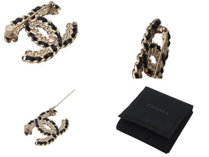 CHANEL シャネル ブローチ アクセサリー ココマーク メタル ラインストーン レザー F21V刻印 ゴールド ブラック 美品 中古 4c070599