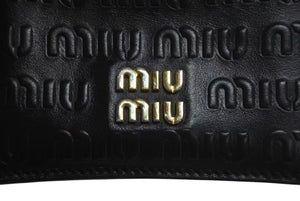 MIU MIU ミュウミュウ マテラッセ 二つ折り財布 ロゴ イタリア製 レザー メタル ブラック ゴールド金具 美品 中古 4c073970