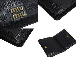 MIU MIU ミュウミュウ マテラッセ 二つ折り財布 ロゴ イタリア製 レザー メタル ブラック ゴールド金具 美品 中古 4c073970