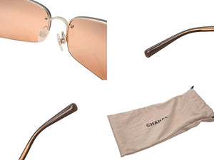 極美品 CHANEL シャネル リムレス サングラス メガネ 4113 イタリア製 メタル レザー オレンジ ゴールド金具 65□15 美品 中古 4c074125