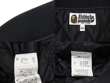 Load image into Gallery viewer, A BATHING APE アベイシングエイプ ロゴ スタジアムジャケット ブラック ナイロン スタジャン 刺繍 001LJH801002M サイズXXL 美品 中古 4c074217