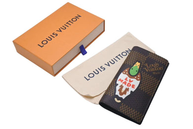 新品未使用 LOUIS VUITTON × NIGO ルイヴィトン ニゴ ダミエ ジャイアント ポルトフォイユ ブラザ 長財布 N60393 ブラウン 中古 4c075437