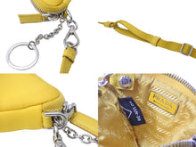 画像をギャラリービューアに読み込む, PRADA プラダ ポーチ トライアングルプレート Re ナイロン ネックストラップ付 イエロー 2TT140 シルバー金具 美品 中古 55940 