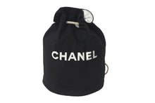 Load image into Gallery viewer, CHANEL シャネル 巾着バッグ キャンバス ビニール ブラック ホワイト ノベルティ 良品 中古 58054