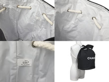 Load image into Gallery viewer, CHANEL シャネル リュックデイパック ロゴ 巾着 プールバッグ キャンバス ノベルティ ブラック ホワイト 良品 中古 60484