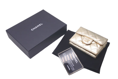 CHANEL シャネル 三つ折り財布 クラシック ココマーク マトラッセ メタリックカーフスキン 31番台 ゴールド 美品 中古 61283