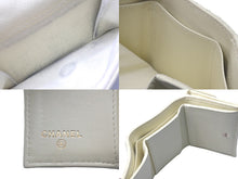 Load image into Gallery viewer, CHANEL シャネル コンパクトウォレット 三つ折り財布 ランダム ココマーク イエロー キャビアスキン 美品 中古 61484