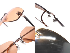 CHANEL シャネル サングラス 57▫︎19 130 4002 C.116/74 オレンジ ココマーク メガネ プラスチック 美品 中古 62012