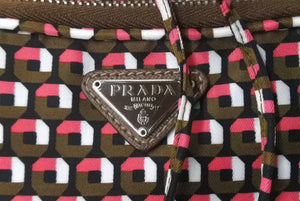 PRADA プラダ ハンドバッグ 1n1863 巾着 ミニバッグ 総柄 マルチカラー ナイロン レザー シルバー金具 良品 中古 63493 