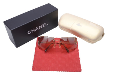 CHANEL シャネル サングラス オレンジ ゴールド プラスチック メタル 62◻︎17 120 4017 c.125/7H B 中古 63501