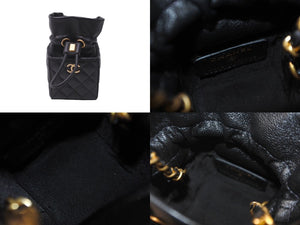 新品同様 CHANEL シャネル ミニ巾着ショルダーバッグ ミニバッグ ブラック 31番台 ラムスキン ゴールド金具 中古 63640