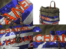 Load image into Gallery viewer, 極美品 CHANEL シャネル クルーズライン バックパック 23番台 キューバ カーキ レッド ブルー スパンコール コットン 中古 64031