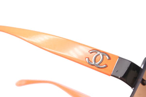 極美品 CHANEL シャネル サングラス ココマーク リムレス 62☐15 125 4017-B c.168/7H オレンジ ブラウン シルバー金具 中古 64468