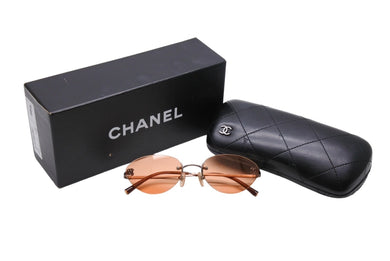 CHANEL シャネル サングラス 眼鏡 ココマーク リムレス 4003 サイズ53□19 130 オレンジ 美品 中古 65282