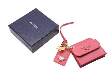 同様に PRADA プラダ カードケース バッグチャーム 1TL344 トライアングルロゴ サフィアーノレザー ピンク ゴールド金具 中古 65866 